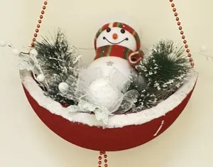 Snowman in red velvet basket